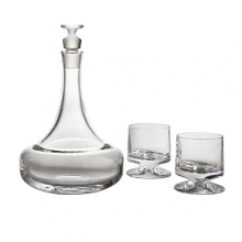 This graceful decanter is made of solid, sparkling full-lead Nambé Crystal, mouth-blown and hand-cut in the traditional manner by the finest European glassblowers according to a 300-year-old process. With two double old fashioned glasses, this decanter set makes a perfect gift. This graceful decanter is made of solid, sparkling full-lead Nambé Crystal, mouth-blown and hand-cut in the traditional manner by the finest European glassblowers according to a 300-year-old process. With two double old fashioned glasses, this decanter set makes a perfect gift.