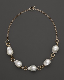 Boldly gleaming baroque freshwater pearls add rich luster to 14K yellow gold. By Nancy B.