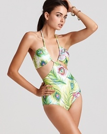 Nanette Lepore's daring peacock print monokini with beads makes a sultry splash. Complete a flirtatious pool side look by teaming this once piece with oversizd shades and flat sandals. Nanette Lepore's daring peacock print monokini with beads makes a sultry splash. Complete a flirtatious pool side look by teaming this once piece with oversizd shades and flat sandals.