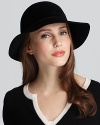 A rollable felt floppy hat from Helen Kaminski, an easy-to-pack accessory that won't lose it's stylish shape.