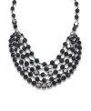 Make an elegant entrance with Carolee's beaded statement necklace. Layered with jet crystals, it's set in hematite tone mixed metal. Approximate length: 24 inches.