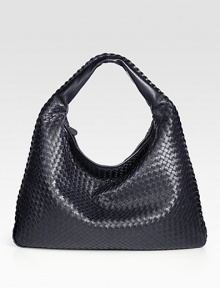 Utter simplicity in buttery woven leather in a classic hobo shape. Single shoulder strap, 5 drop Braid trim Top zip closure Inside zip pocket Suede lining 22W X 15H X 2½D Made in Italy Utter simplicity in buttery woven leather in a classic hobo shape. Single shoulder strap, 5 drop Braid trim Top zip closure Inside zip pocket Suede lining 22W X 15H X 2½D Made in Italy