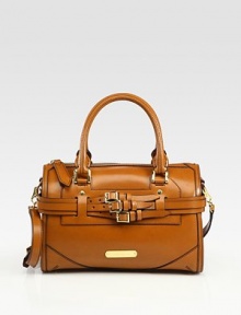 Tailored elegance in rich calfskin with buckle strap detail and gleaming hardware.Double top handles, 5 dropAdjustable, detachable buckle shoulder strap, 21-22 dropTop zip close with tab pullProtective metal feetOutside buckle straps and signature plaqueOne inside zip pocket and two inside open pocketsCotton check lining12W X 7¾H X 6½DMade in Italy Tailored elegance in rich calfskin with buckle strap detail and gleaming hardware.Double top handles, 5 dropAdjustable, detachable buckle shoulder strap, 21-22 dropTop zip close with tab pullProtective metal feetOutside buckle straps and signature plaqueOne inside zip pocket and two inside open pocketsCotton check lining12W X 7¾H X 6½DMade in Italy