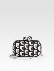 A bold clutch in nylon and leather, with a graphic heart-and-keyhole print and silvertone hardware.Detachable shoulder strap, 21 dropKiss-lock closureOne inside open compartmentFully lined6½W X 3½H X 1¾DImported A bold clutch in nylon and leather, with a graphic heart-and-keyhole print and silvertone hardware.Detachable shoulder strap, 21 dropKiss-lock closureOne inside open compartmentFully lined6½W X 3½H X 1¾DImported