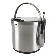 An attractive ice dispenser in sleek stainless steel is accompanied with a smart pair of tongs for a clean, modern convenience. An attractive ice dispenser in sleek stainless steel is accompanied with a smart pair of tongs for a clean, modern convenience.