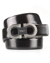 A handsome belt with a double Gancini logo makes a strong contribution to your professional wardrobe.