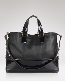 Upgrade wardrobe staples with Z Spoke Zac Posen's leather tote. Designed to meet daytime demands, this bag shines with tailored separates and a take-charge attitude.