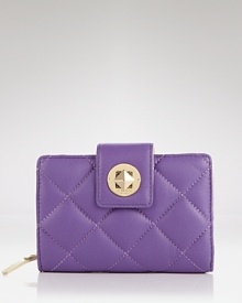 This quilted leather wallet from kate spade new york has a decidedly uptown allure. Goldtone hardware ups the luxe factor, while pockets are plenty practical. This quilted leather wallet from kate spade new york has a decidedly uptown allure. Goldtone hardware ups the luxe factor, while pockets are plenty practical.