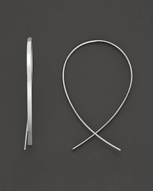 A gracefully-arching upside hoop earring in 14 Kt. white gold. A gracefully-arching upside hoop earring in 14 Kt. white gold.