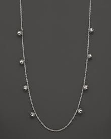 Inspired by Zen philosophy, this intricately detailed sterling silver necklace from Paul Morelli softly jingles with eight meditation bells.