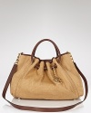 Introduce texture into your on-vacation look with MICHAEL Michael Kors' straw tote. Sized to stow seaside essentials, this leather-trimmed bag is at its best with a maxi dress and laid back attitude.
