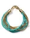 Work Southwestern flair into your accessory collection with MICHAEL Michael Kors' turquoise chain bracelet. Wear the the Santa Fe-inspired style day and night--it loves denim and LBDs.