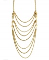 Take the layering trend to a whole new level. BCBGeneration's standout style features eight rows draped on top of one another for an ultra-chic look. Set in gold tone mixed metal. Approximate length: 16 inches. Approximate drop: 9-1/2 inches.