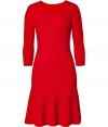 Amp up your work look with a shock of color in Issas bright red cable knit dress, finished with a ruffled hemline for that fantastically flirty feel - Rounded neckline, 3/4 sleeves, pull-over style - Flared hemline, form-fitting - Team with favorite flats and chunky statement jewelry