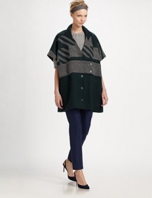 Wonderfully warm felted wool in a bold, graphic pattern defines this oversized design.Stand collarV necklineButton front with tab detailShort cape sleevesAbout 33 from shoulder to hemWoolDry cleanMade in Italy of imported fabricModel shown is 5'9 (175cm) wearing US size 4. Wonderfully warm felted wool in a bold, graphic pattern defines this oversized design.Stand collarV necklineButton front with tab detailShort cape sleevesAbout 33 from shoulder to hemWoolDry cleanMade in Italy of imported fabricModel shown is 5'9 (175cm) wearing US size 4.