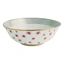 From Bernardaud, jewel-like shapes inspired by the 1940's and an exuberant design imbue this dinnerware pattern with a baroque and precious quality. Etoiles's bold styling offers a new interior aesthetic full of whimsy. From Bernardaud, jewel-like shapes inspired by the 1940's and an exuberant design imbue this dinnerware pattern with a baroque and precious quality. Etoiles's bold styling offers a new interior aesthetic full of whimsy.