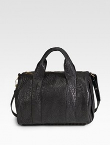 Soft, pebbled leather design in a chic duffel shape for the right mix of classic and cool.Double top handles, 3½ drop Shoulder strap, 15 drop Top zip closure One inside zip pocket Fully lined 12½W X 9H X 9D Imported Soft, pebbled leather design in a chic duffel shape for the right mix of classic and cool.Double top handles, 3½ drop Shoulder strap, 15 drop Top zip closure One inside zip pocket Fully lined 12½W X 9H X 9D Imported