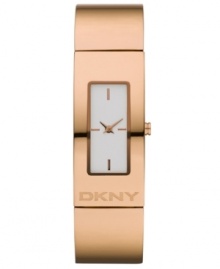 Rosy hues highlight a sleek bracelet from DKNY. Watch crafted of rose-gold ion-plated stainless steel bracelet with logo and rectangular case. White dial features rose-gold tone applied stick indices at three, six, nine and twelve o'clock and two hands. Quartz movement. Water resistant to 30 meters. Two-year limited warranty. Rosy hues highlight a sleek bracelet from DKNY. Watch crafted of rose-gold ion-plated stainless steel bracelet with logo and rectangular case. White dial features rose-gold tone applied stick indices at three, six, nine and twelve o'clock and two hands. Quartz movement. Water resistant to 30 meters. Two-year limited warranty.