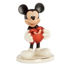 With a heart of bold red, Mickey Mouse shows he's totally smitten in this adorable Disney figurine. Glazed and glitter accents in Lenox fine china add even more to love.