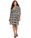 Delight from day to play with AGB's three-quarter sleeve plus size dress, outlined by a slimming faux wrap design.