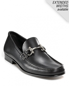 Stylish gancini bit lends a refined look to these slip-on loafers. Luxe leather upper, lining and sole. Contrast topstitching throughout. Stylish gancini bit lends a refined look to these slip-on loafers. Luxe leather upper, lining and sole. Contrast topstitching throughout.