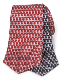 A luxurious piece that lies at the center of your dress wardrobe, this handsome tie from Salvatore Ferragamo is crafted in 100% Italian silk. A luxurious piece that lies at the center of your dress wardrobe, this handsome tie from Salvatore Ferragamo is crafted in 100% Italian silk.