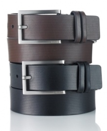 With a look so sleek, you'll want this Calvin Klein belt in black and brown.