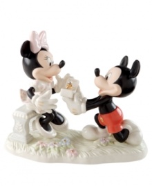 Pop the question with a little help from Disney. Mickey finally takes the plunge, asking for Minnie Mouse's hand in this romantic figurine crafted of Lenox fine china with beautiful color and sparkling gold detail. Pop the question with a little help from Disney. Mickey finally takes the plunge, asking for Minnie Mouse's hand in this romantic figurine crafted of Lenox fine china with beautiful color and sparkling gold detail.