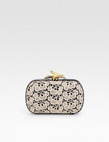 A truly feminine design with pretty floral lace on glossy patent leather.Detachable chain shoulder strap, 20½ dropTop clasp closureOne inside open pocketFully lined7W X 4½H X 1DImported A truly feminine design with pretty floral lace on glossy patent leather.Detachable chain shoulder strap, 20½ dropTop clasp closureOne inside open pocketFully lined7W X 4½H X 1DImported