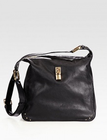 Sumptuous lambskin crafted in a slouchy silhouette with mini-studs and polished padlock hardware.Adjustable crossbody strap, 16-21½ dropTop zip closureOne outside open pocketOne inside open pocketLinen lining12½W X 12H X 4½DMade in Italy Sumptuous lambskin crafted in a slouchy silhouette with mini-studs and polished padlock hardware.Adjustable crossbody strap, 16-21½ dropTop zip closureOne outside open pocketOne inside open pocketLinen lining12½W X 12H X 4½DMade in Italy