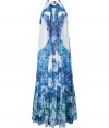 Effortless glamour is easily achieved in this luxe printed maxi dress from Roberto Cavalli - Halter top, sleeveless, relaxed silhouette, all-over print, ruffled hem - Wear with embellished sandals, a fringed shawl, and a statement clutch