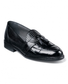 Blend new textures into your everyday rotation of men's dress shoes. This pair of genuine snakeskin men's loafers features overlapping panels of crocodile and lizard pattern leather, accented with a classic tassel detail at the tongue. Leather lined, rubber sole. Imported. Blend new textures into your everyday rotation of men's dress shoes. This pair of genuine snakeskin men's loafers features overlapping panels of crocodile and lizard pattern leather, accented with a classic tassel detail at the tongue. Leather lined, rubber sole. Imported.