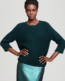 In a chunky knit, Tibi's ultra-soft sweater makes an unexpected exit with a subtle, open back. In a chunky knit, Tibi's ultra-soft sweater makes an unexpected exit with a subtle, open back.