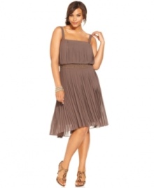 Nine West's plus size dress balances a flirty femme feel with a dose of daring thanks to its blouson-style bodice, pretty pleating and edgy studded waistband. Nine West's plus size dress balances a flirty femme feel with a dose of daring thanks to its blouson-style bodice, pretty pleating and edgy studded waistband.