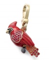 Songbird charm. Juicy Couture's cardinal charm features colorful epoxy, crystal accents and a lobster clasp. Chain not included. Set in gold tone mixed metal. Approximate drop: 1-1/2 inches.