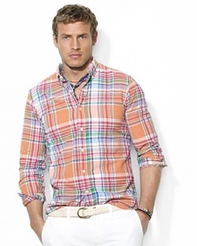 The ultimate preppy essential, a trim-fitting sport shirt is crafted from soft cotton poplin with a bright madras print for handsome style. The ultimate preppy essential, a trim-fitting sport shirt is crafted from soft cotton poplin with a bright madras print for handsome style.