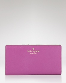 This simple wallet takes kate spade new york's day-right style to sophisticated terrain. Not only does it boast ample pockets, but there's luxe leather for added allure. This simple wallet takes kate spade new york's day-right style to sophisticated terrain. Not only does it boast ample pockets, but there's luxe leather for added allure.