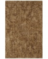 Add rich, shimmering texture to any modern room with the Metallic taupe area rug from Dalyn. Hand-tufted of soft polyester, this high-luster shag area rug puts comfort and fun back in floor decor.