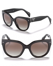 Invest in the forever sunglass like these round wayfarer shades from Prada.