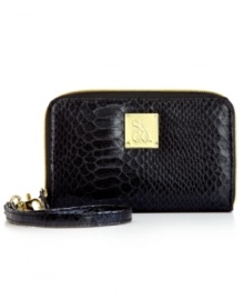Add posh yet practical style to your accessorizing with this fab cell phone wristlet from Style&co. Chic croc-embossed pattern and signature hardware adorn the outside, while the well-organized interior discretely stows phone, cards, cash and fave lip gloss. Add posh yet practical style to your accessorizing with this fab cell phone wristlet from Style&co. Chic croc-embossed pattern and signature hardware adorn the outside, while the well-organized interior discretely stows phone, cards, cash and fave lip gloss.