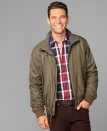 The perfect pairing for the season, this Tommy Hilfiger jacket has a nylon body and fleece lining for an easy, casual look.