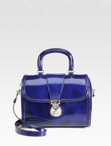 Polished leather bag with flap closure.Top handle, 4 dropDetachable shoulder strap, 16½ dropPush-lock flap closure with zipperProtective metal feetOne inside zip pocketTwo inside open pocketsSatin lining10½W X 8½H X 5½DMade in Italy Polished leather bag with flap closure.Top handle, 4 dropDetachable shoulder strap, 16½ dropPush-lock flap closure with zipperProtective metal feetOne inside zip pocketTwo inside open pocketsSatin lining10½W X 8½H X 5½DMade in Italy