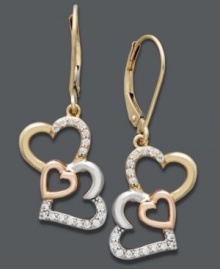 Feeling the love? Cherish every moment in Treasured Hearts' adorable dangly earrings. Three, cut-out hearts are decorated with round-cut diamonds (1/5 ct. t.w.) and set in 14k gold, 14k rose gold, and sterling silver. Approximate drop: 1 inch. Feeling the love? Cherish every moment in Treasured Hearts' adorable dangly earrings. Three, cut-out hearts are decorated with round-cut diamonds (1/5 ct. t.w.) and set in 14k gold, 14k rose gold, and sterling silver. Approximate drop: 1 inch.