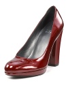 Slick patent leather gleams over a chunky heel and platform. Stuart Weitzman's power pumps are office-perfect--and cocktail hour appropriate.