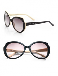 A unique, plastic style with cut-out corners. Available in black with brown gradient lens. Logo temples100% UV protectionImported A unique, plastic style with cut-out corners. Available in black with brown gradient lens. Logo temples100% UV protectionImported
