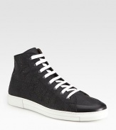 This gancini-embroidered canvas lace-up, with a hi-top profile and contrast sole, is the epitome of casual luxury.Canvas upperLeather liningPadded insoleRubber soleMade in Italy
