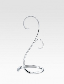 Display your lovely ornaments anywhere, any season, with this graceful crystal-accented stand that holds two at once.Silvertone Crystal accent About 7H X 4W Imported Display your lovely ornaments anywhere, any season, with this graceful crystal-accented stand that holds two at once.Silvertone Crystal accent About 7H X 4W Imported