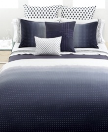 Vera Wang's Dip Dye Dot duvet cover boasts a Swiss dot pattern on an ombré ground that graduates from deep indigo to off-white. Finished with ric-rac trim for added flair. Reverses to self; hidden button closure.