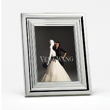 With Love silver giftware has been introduced as a response to Vera Wangs successful dinnerware, stem and flatware patterns which were launched in September 2007. The silver plated giftware features seven intricate jewelry inspired bands to continue the With Love story. With Love silver giftware has been introduced as a response to Vera Wangs successful dinnerware, stem and flatware patterns which were launched in September 2007. The silver plated giftware features seven intricate jewelry inspired bands to continue the With Love story.