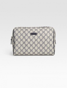 GG plus coated canvas with leather trim and nickel hardware. Top zip closure Washable interior 9¾W X 6H X 4¼D Made in Italy GG plus coated canvas with leather trim and nickel hardware. Top zip closure Washable interior 9¾W X 6H X 4¼D Made in Italy